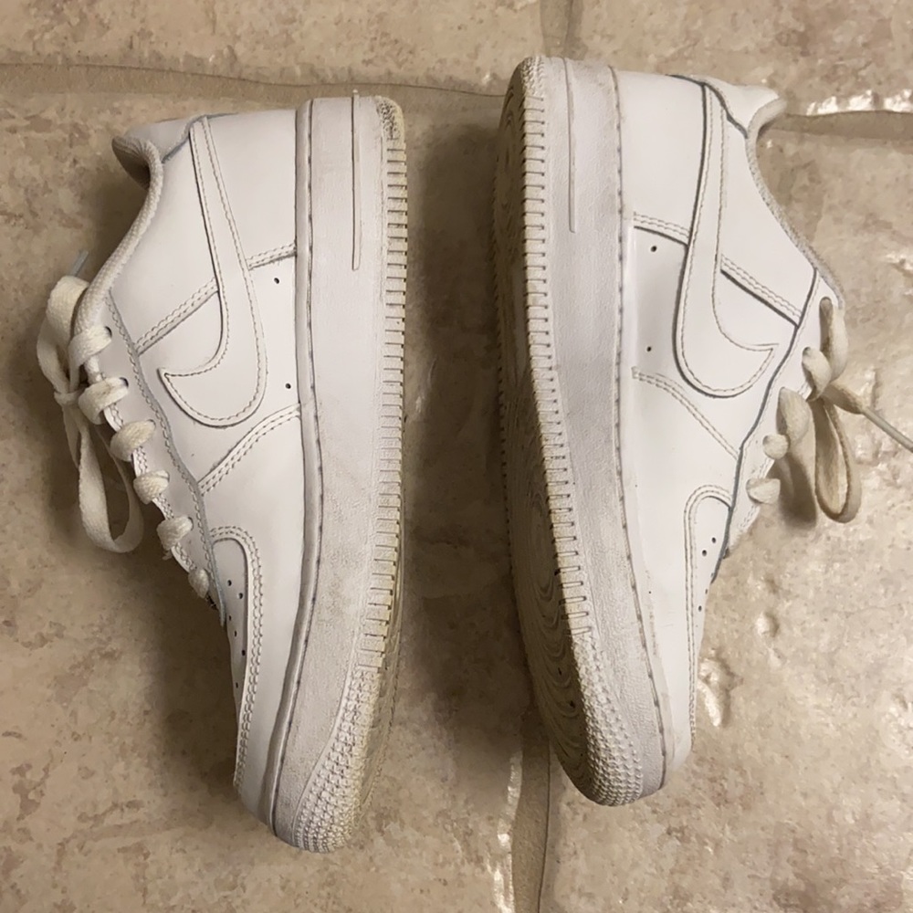 White Nike Air Force 1. Size 4 in big kids.